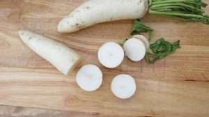 White radish on a wooden board